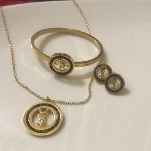 Pendant and bangle earrings set is coated with 18 karat god